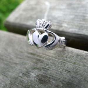 White gold Claddagh ring (the black reflections ar from the lens of the camera) Handmade claddagh ring, and Irish Jewellery icon