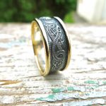 Irish Jewellery design in the form of a Celtic ring Between the gold rims the oxidised silver is approx 10mm in width