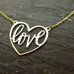 Irish jewellery crafted into the form of a heart with delicate calligraphy